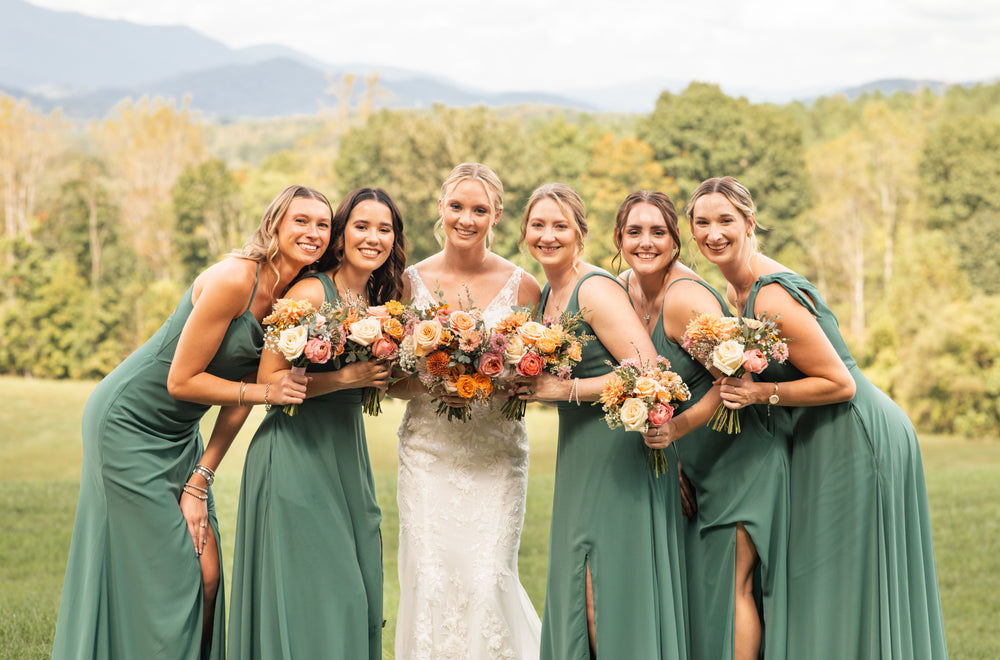 Bridal party wears eucalyptus green bridesmaid dresses