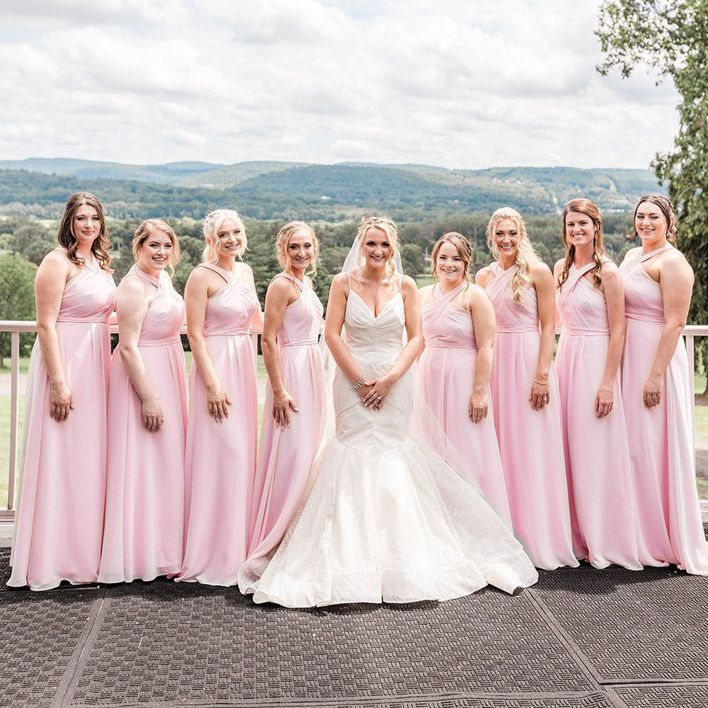 Bridal party wears blossom pink bridesmaid dresses