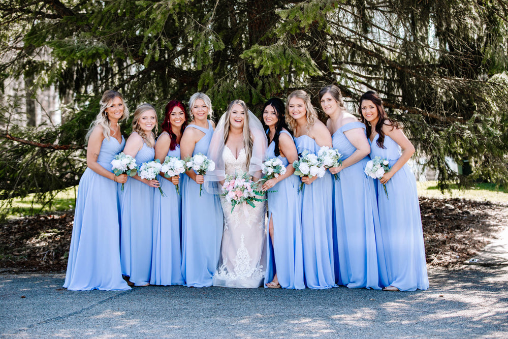 Bridal party wears cornflower blue bridesmaid dresses