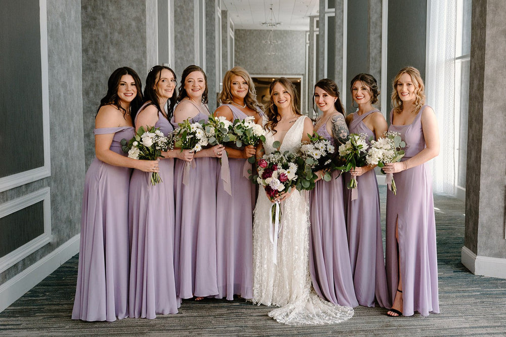 Bridal party wears french lilac bridesmaid dresses