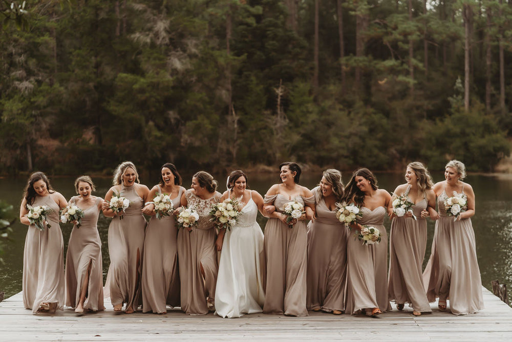 Bridal party wears latte bridesmaid dresses