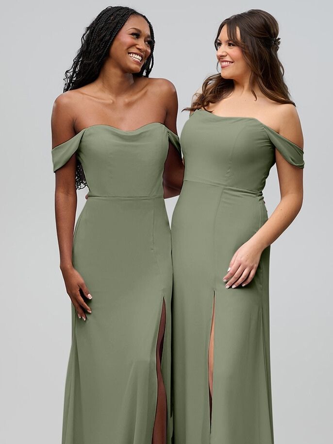 Two models wear Kennedy Blue Mia in Moss while smiling at each other