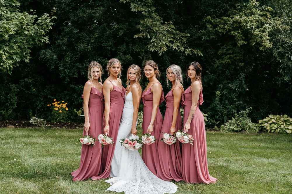 Bridal party wears rosewood bridesmaid dresses